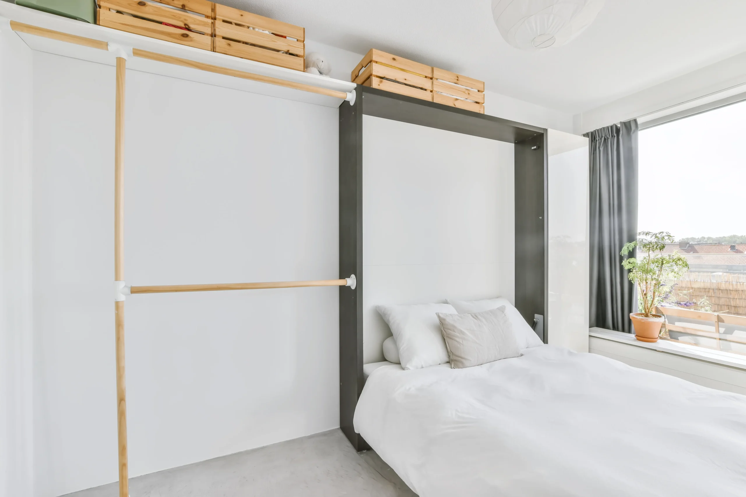 Murphy wall bed in compact bedroom